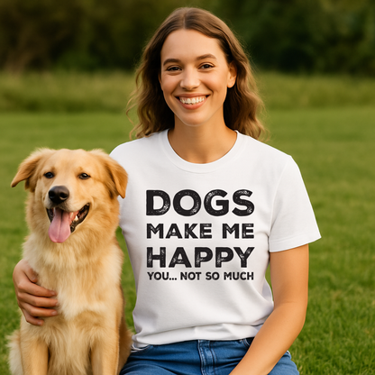 Woman wearing a t-shirt with 'DOGS MAKE ME HAPPY YOU... NOT SO MUCH' text, standing with a dog in a grassy field.